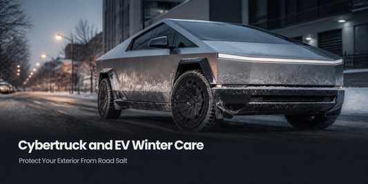 Stainless steel angular electric truck covered in winter road salt spray, SqueCle EV winter protection blog hero